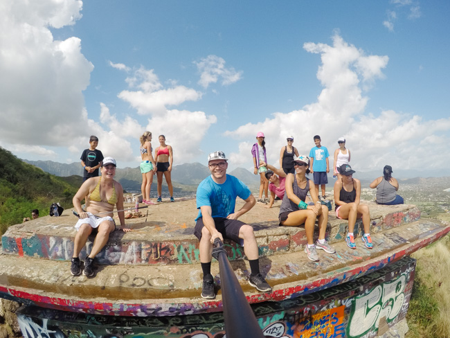 A group of people hiking along the Lanikai Pillbox trail 